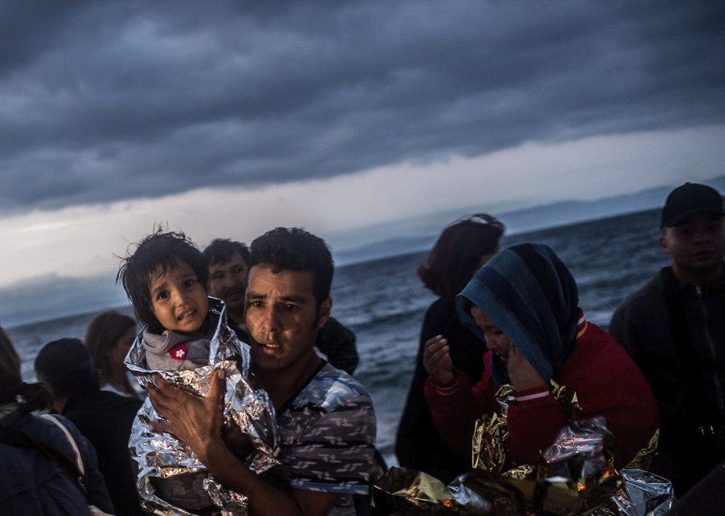 Varios refugiados, a su llegada a la isla de Lesbos, GreciaOctubre de 2015./ EFE/Filip Singer
